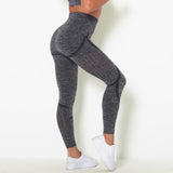 Feste schwarze Frauen-Sport-Hosen-reizvolle atmungsaktive hohle Yoga-Gamaschen-hohe elastische Gymnastik-Gamaschen-Patchwork-Hüften drücken Yoga-Hosen hoch